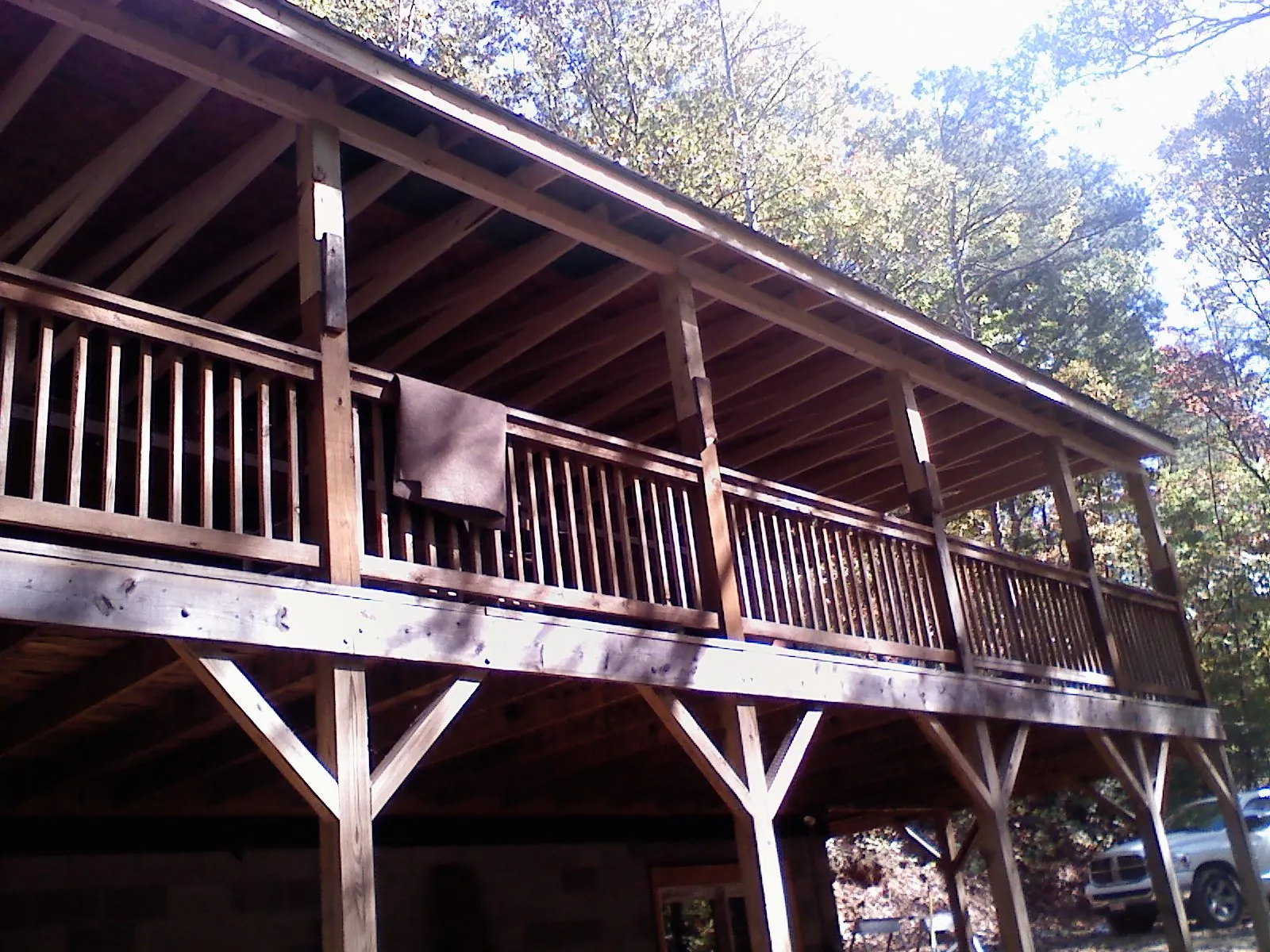 Timber framing under a new elevated porch and deck — Roof Leak Repair in Happy Jack by Roofing Brothers